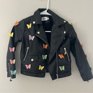 black leather jacket with butterflies